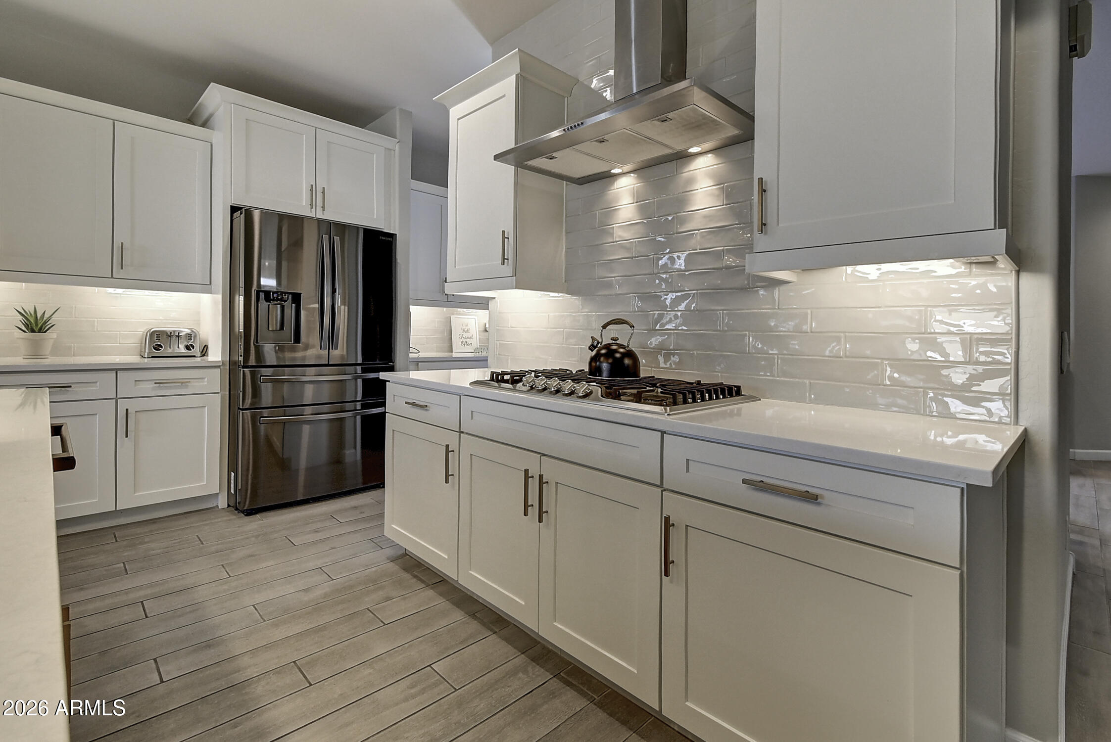 2140 East Alameda Road Phoenix, AZ 85024 - Photo 14 of 54 a kitchen with cabinets stainless steel appliances and a window