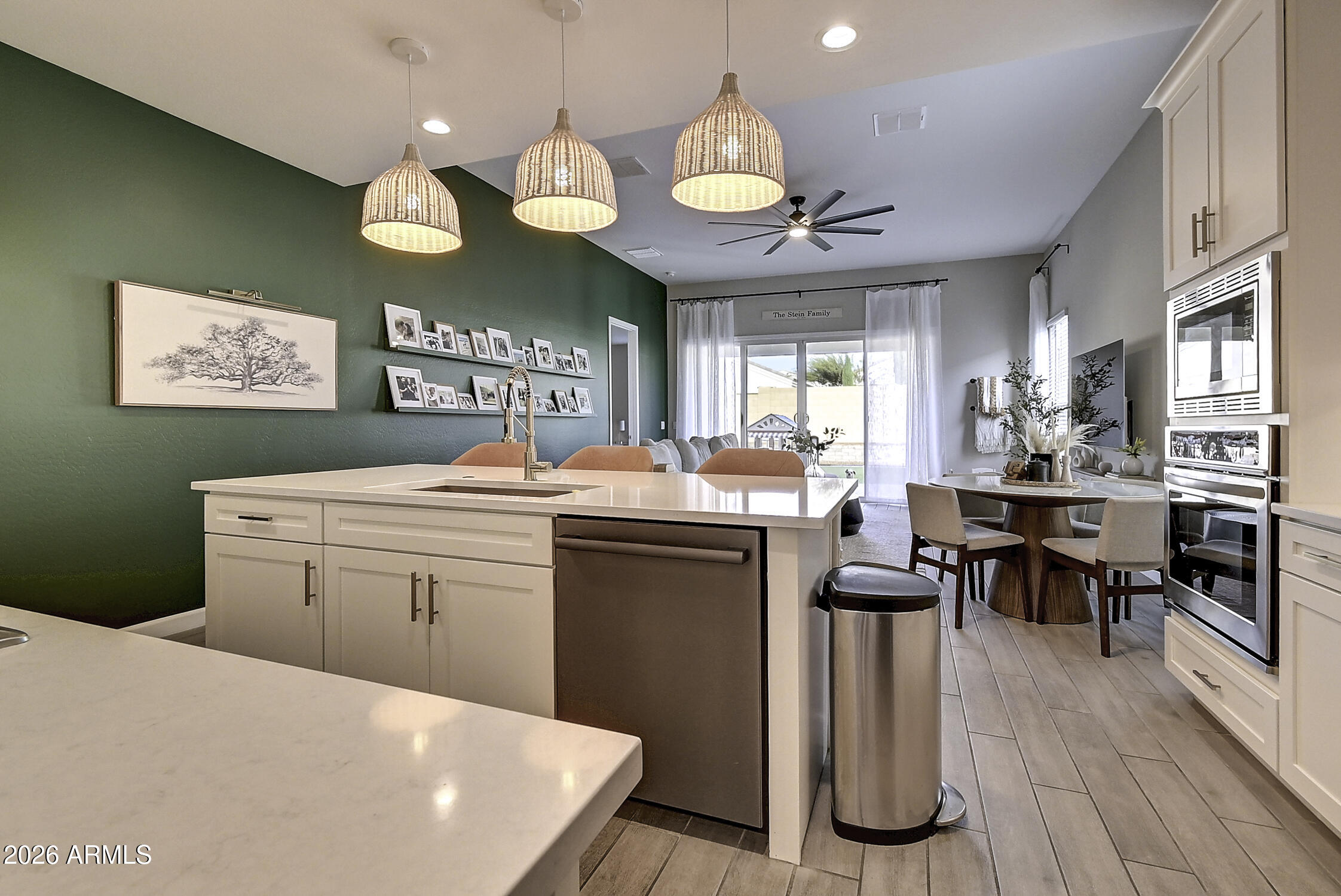 2140 East Alameda Road Phoenix, AZ 85024 - Photo 18 of 54 a kitchen with a sink cabinets and wooden floor