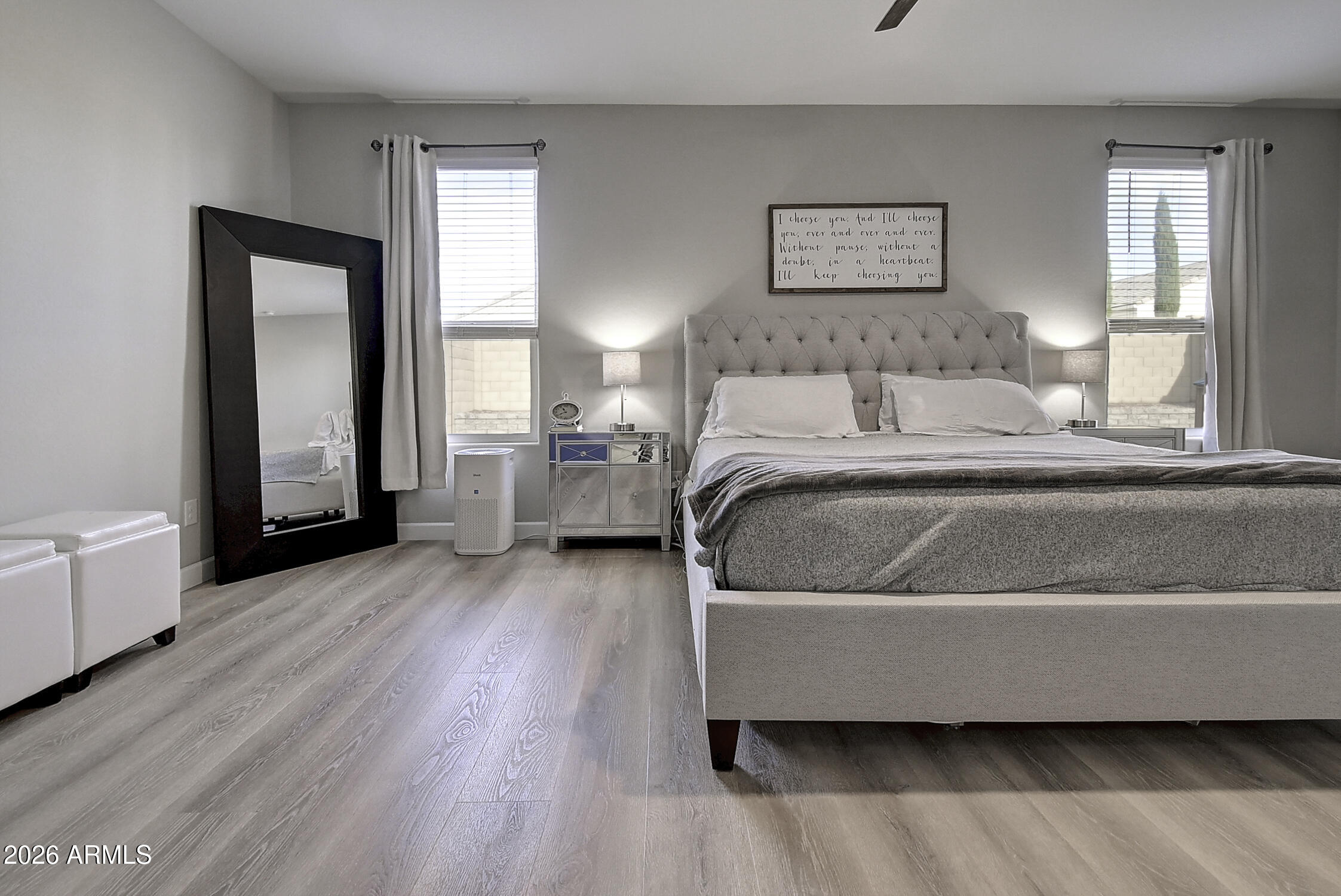 2140 East Alameda Road Phoenix, AZ 85024 - Photo 25 of 54 a spacious bedroom with a bed and wooden floor