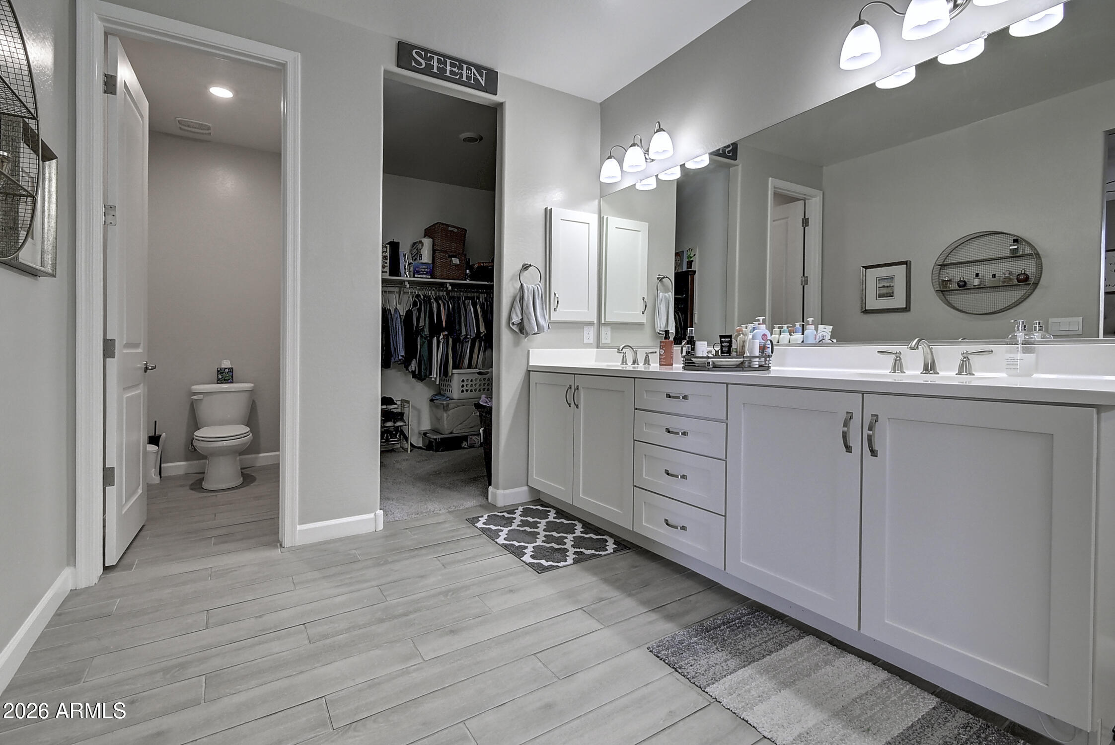 2140 East Alameda Road Phoenix, AZ 85024 - Photo 27 of 54 a spacious bathroom with a granite countertop sink a toilet and a mirror
