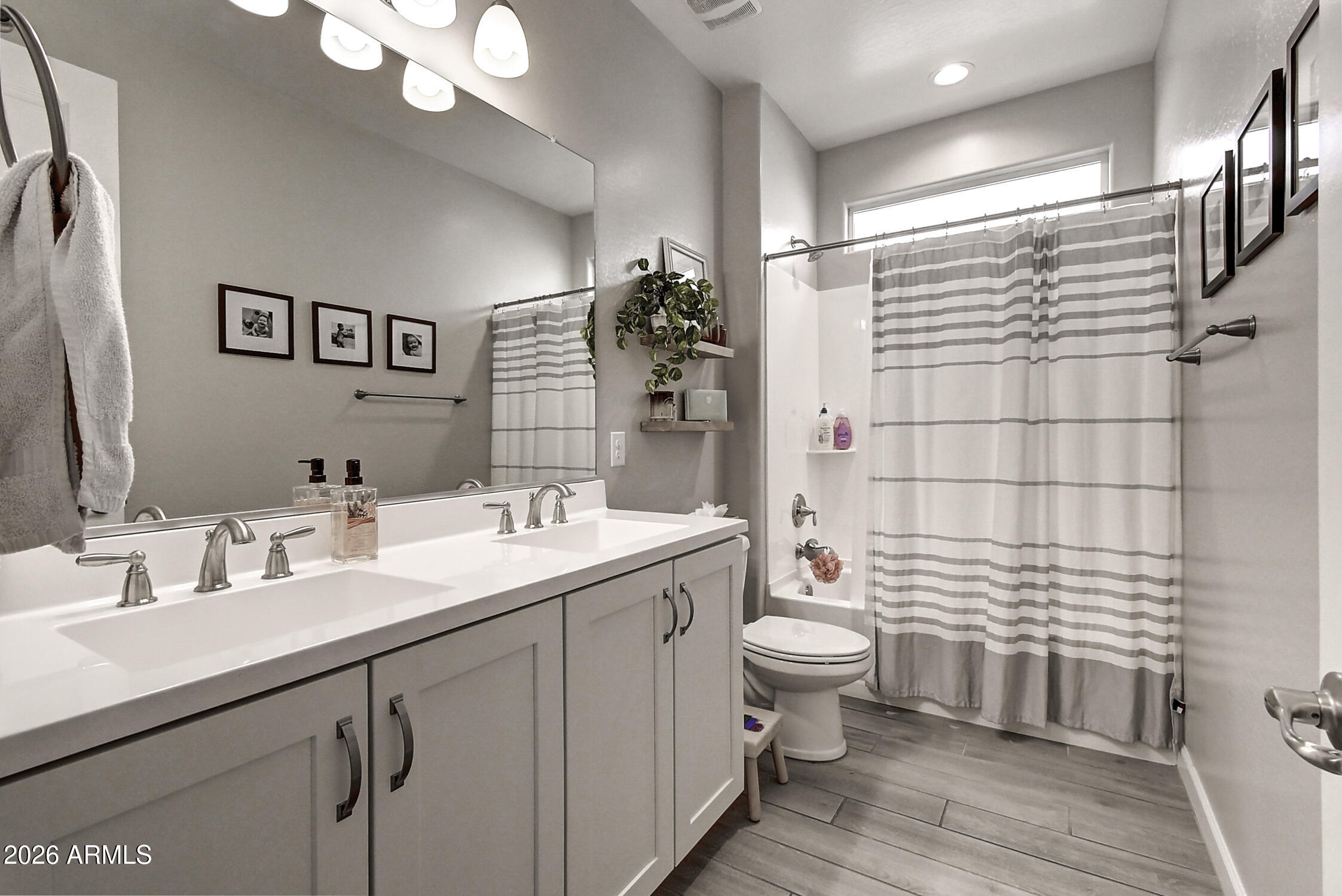 2140 East Alameda Road Phoenix, AZ 85024 - Photo 35 of 54 a bathroom with a double vanity sink mirror and toilet