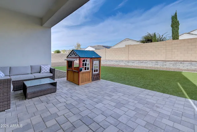 a backyard of a house with seating space