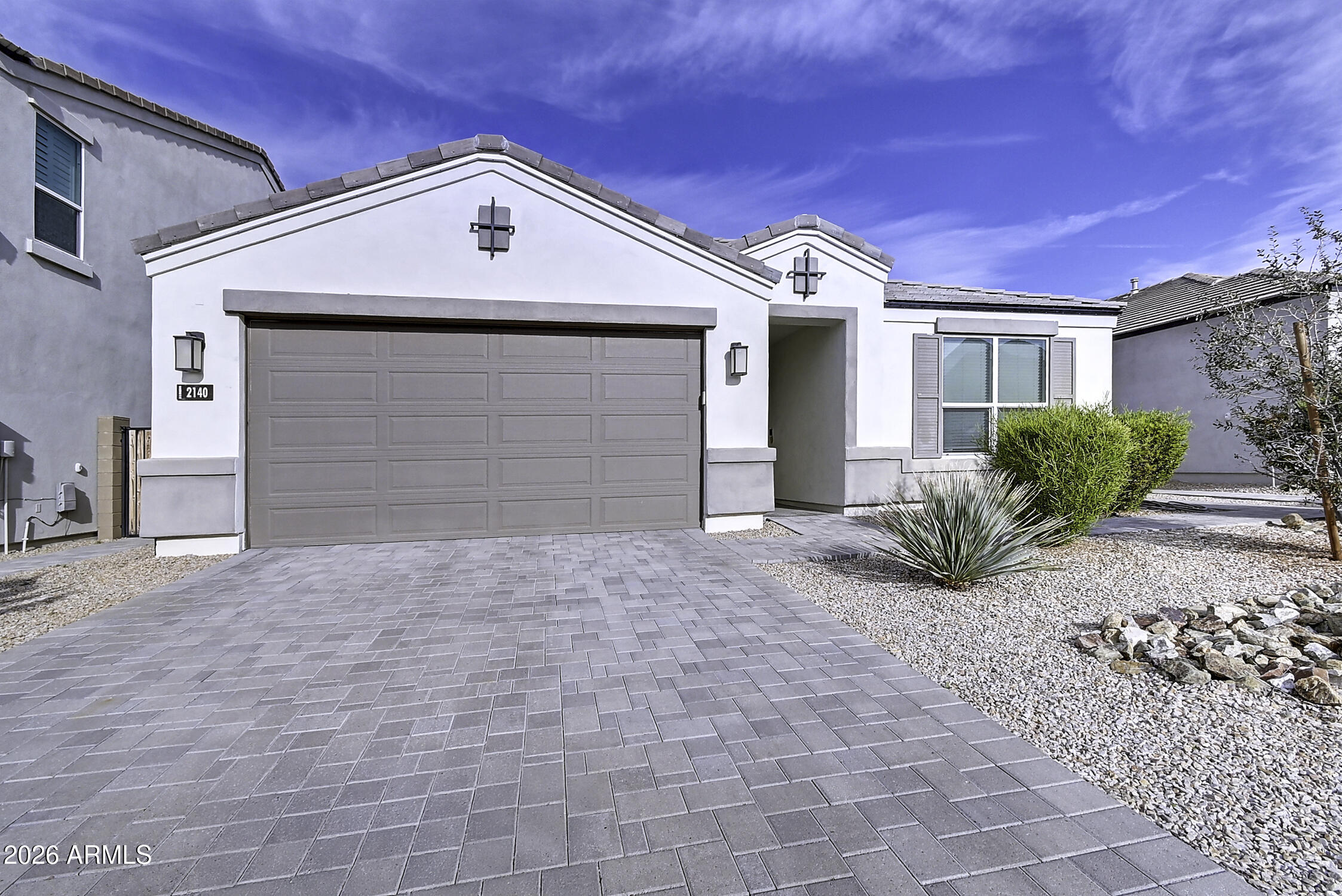 2140 East Alameda Road Phoenix, AZ 85024 - Photo 45 of 54 a front view of a house with a yard and garage