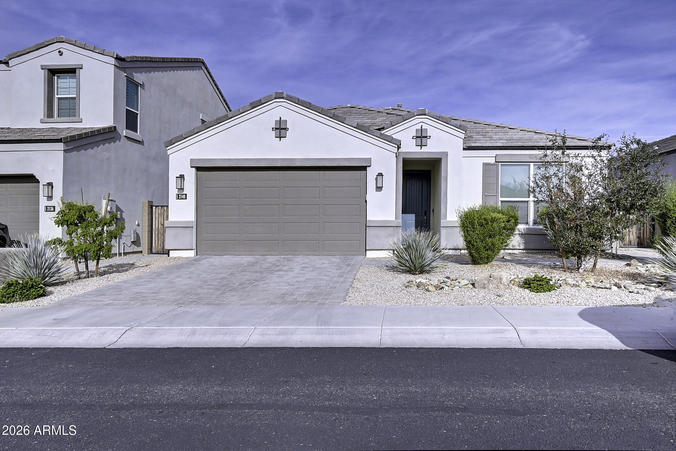 2140 East Alameda Road Phoenix, AZ 85024 - Photo 46 of 54 a view of a house with a small yard and potted plants