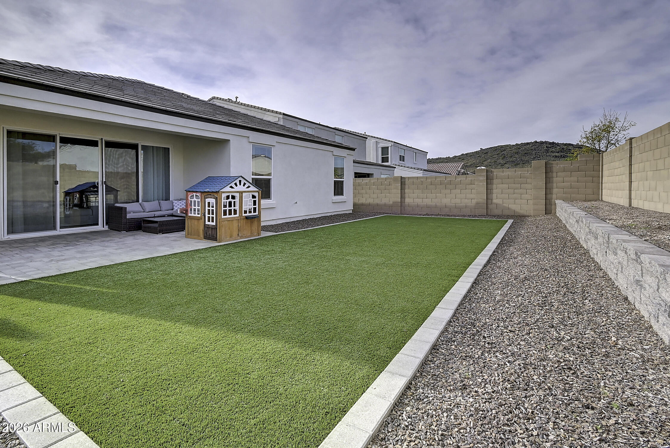 2140 East Alameda Road Phoenix, AZ 85024 - Photo 5 of 54 a view of a house with backyard porch and sitting area