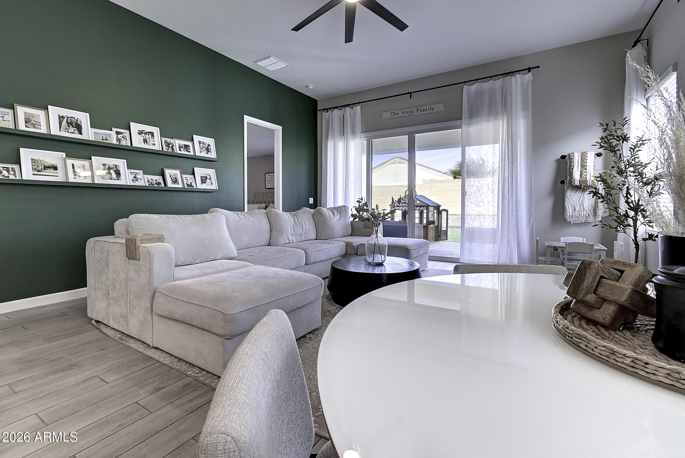 2140 East Alameda Road Phoenix, AZ 85024 - Photo 8 of 54 a living room with furniture and a large window