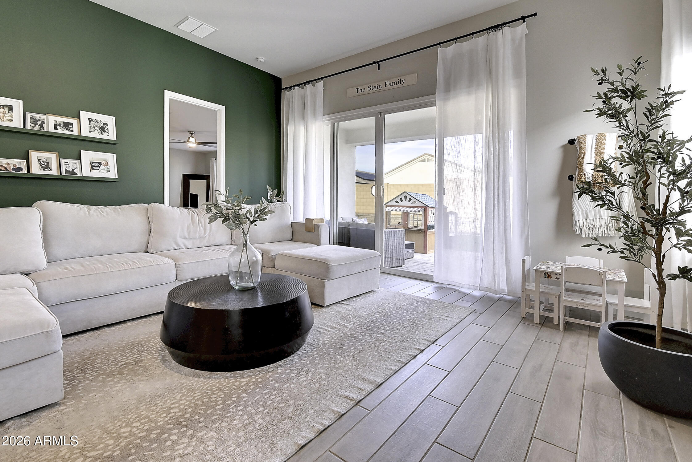 2140 East Alameda Road Phoenix, AZ 85024 - Photo 9 of 54 a living room with furniture and a large window