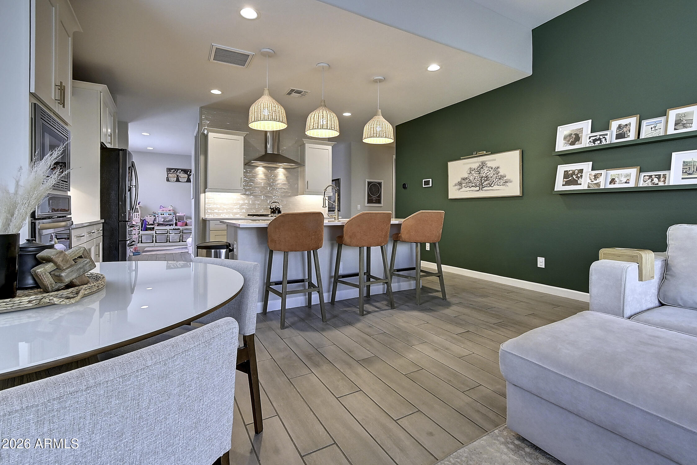 2140 East Alameda Road Phoenix, AZ 85024 - Photo 10 of 54 a living room with furniture a rug and a large window