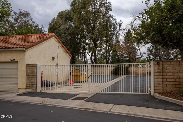 a view of a porch with a fence
