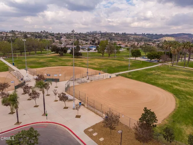 a view of a swimming pool with a lake view