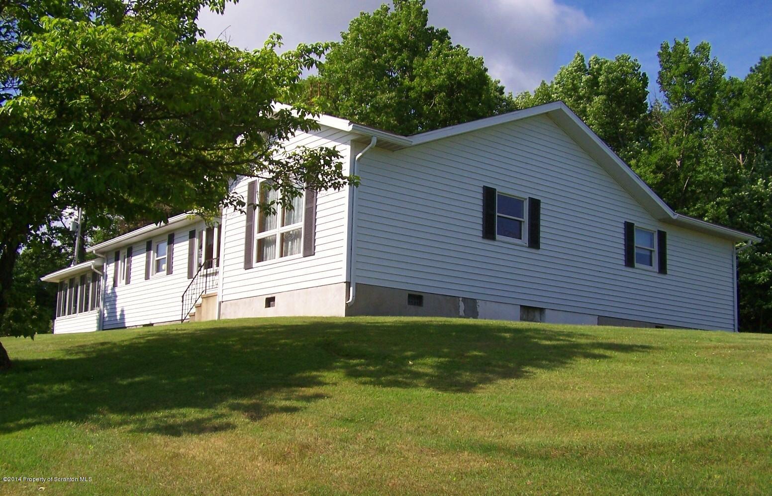 1327 Demunds Road Dallas, PA 18612 - Photo 4 of 39 a view of a house with a yard