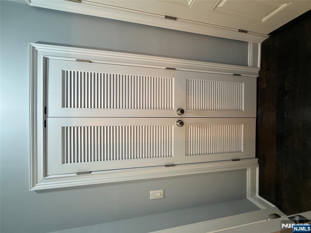 46 High Street Clifton, NJ 07014 - Photo 11 of 14 an empty room with wooden floor