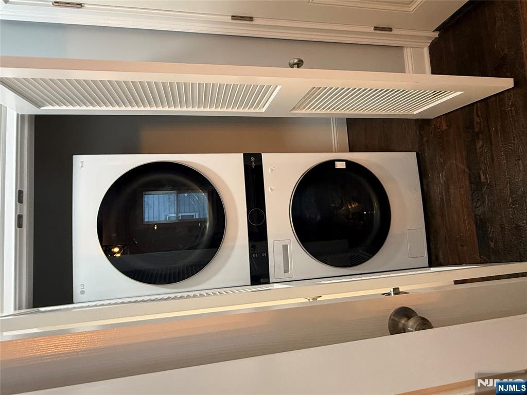 46 High Street Clifton, NJ 07014 - Photo 12 of 14 a utility room with dryer and washer