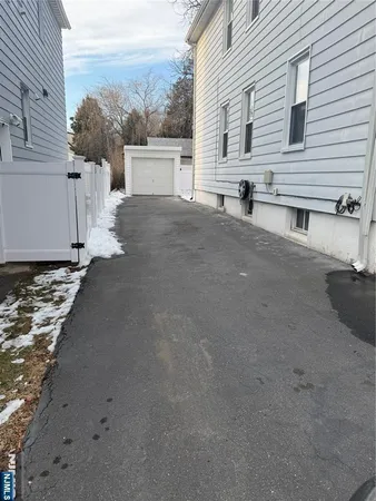 a view of a house with backyard