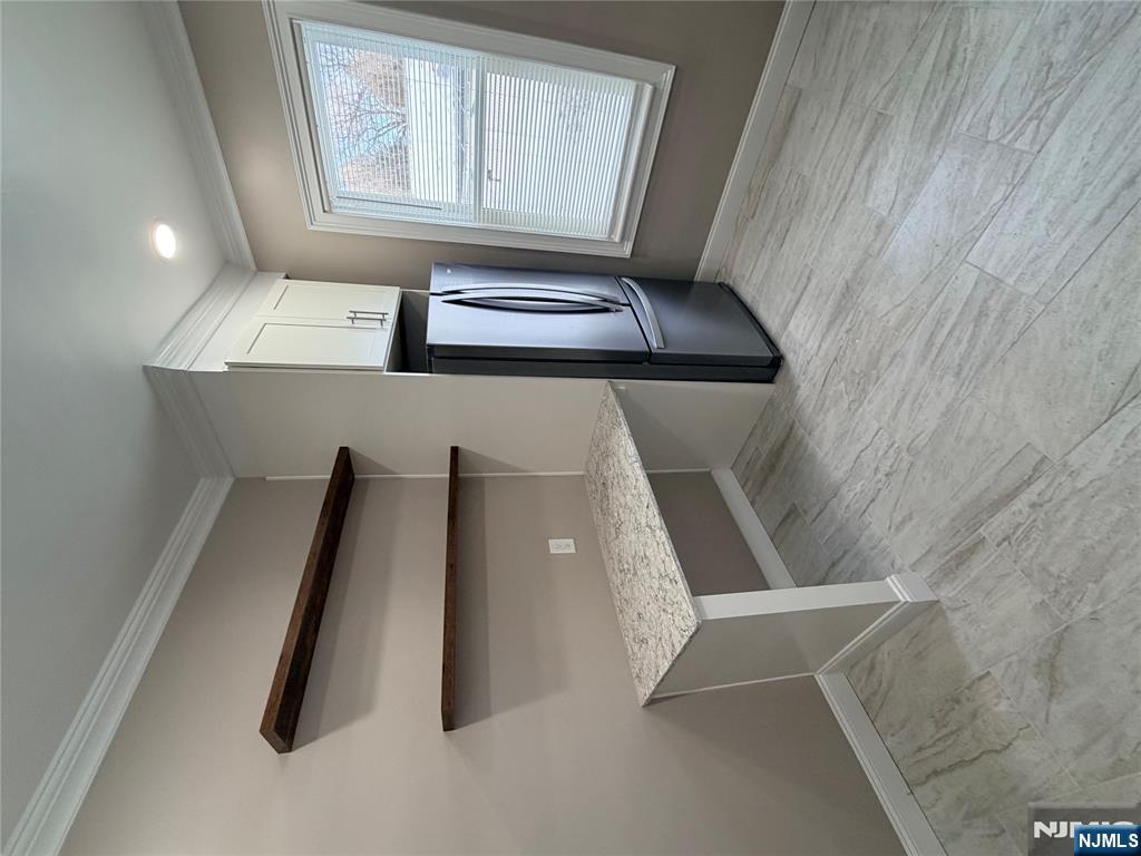 46 High Street Clifton, NJ 07014 - Photo 4 of 14 a view of an empty room with a window