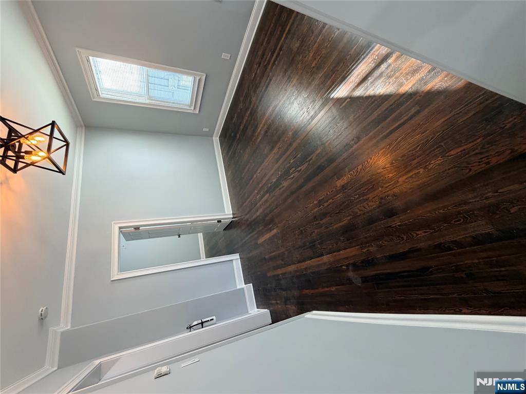 46 High Street Clifton, NJ 07014 - Photo 5 of 14 a view of an entryway with wooden floor