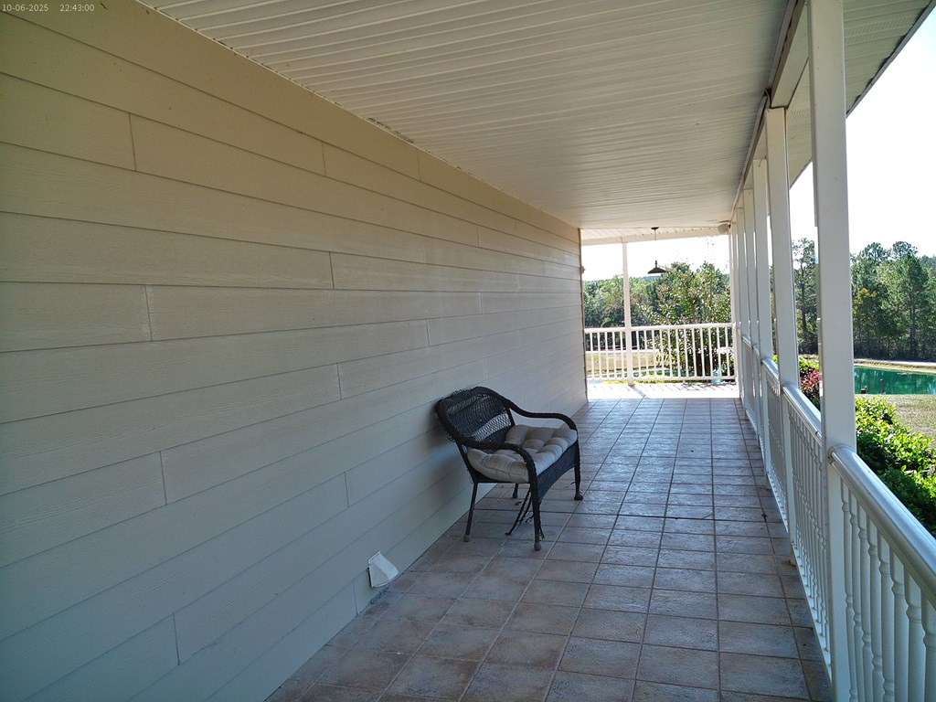 12543 Harrelson Loop Andalusia, AL 36420 - Photo 16 of 52 Side porch