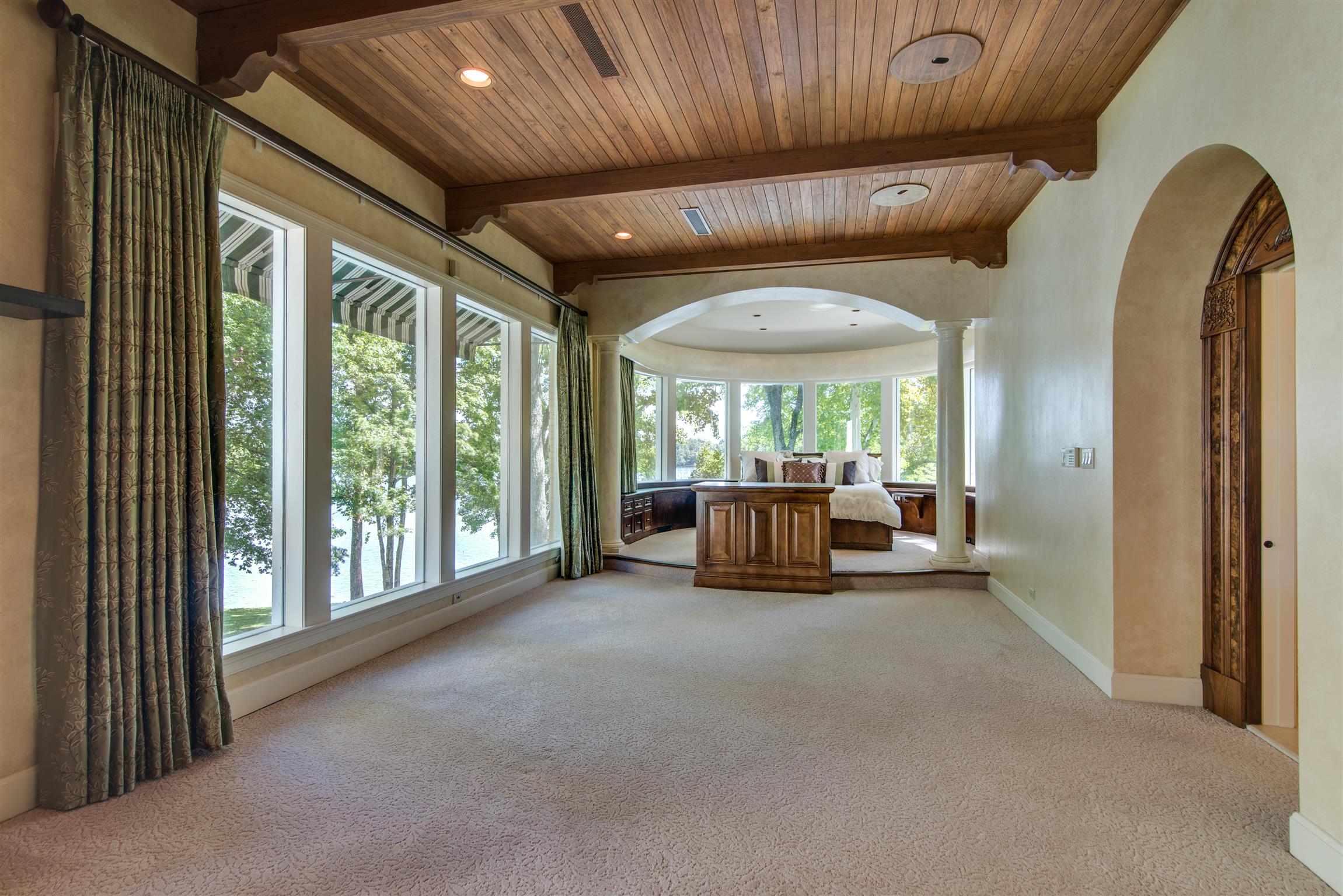 175 Cherokee Dock Road Lebanon, TN 37087 - Photo 15 of 30 a view of a livingroom with furniture and floor to ceiling window
