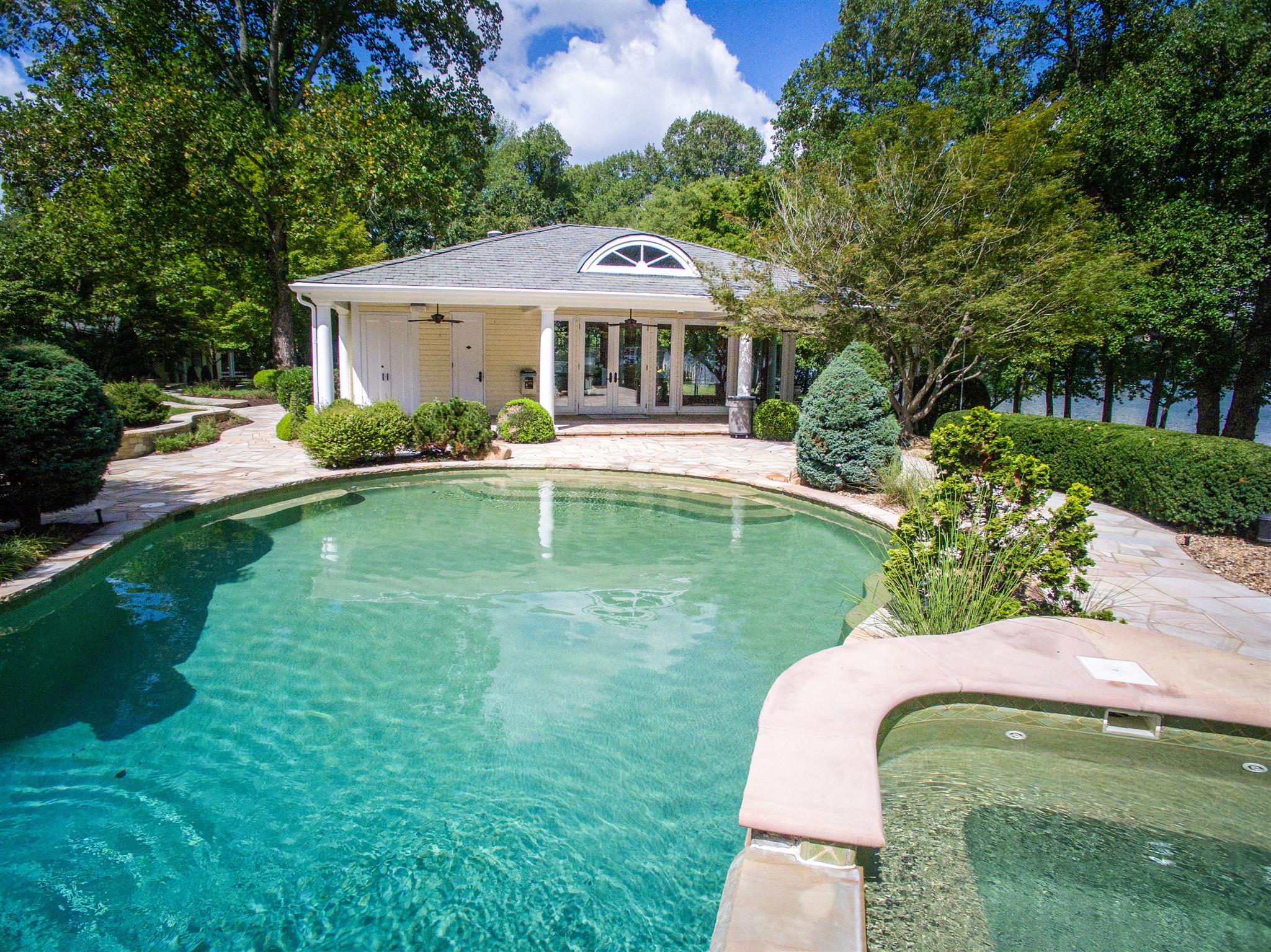 175 Cherokee Dock Road Lebanon, TN 37087 - Photo 22 of 30 a front view of a house with garden
