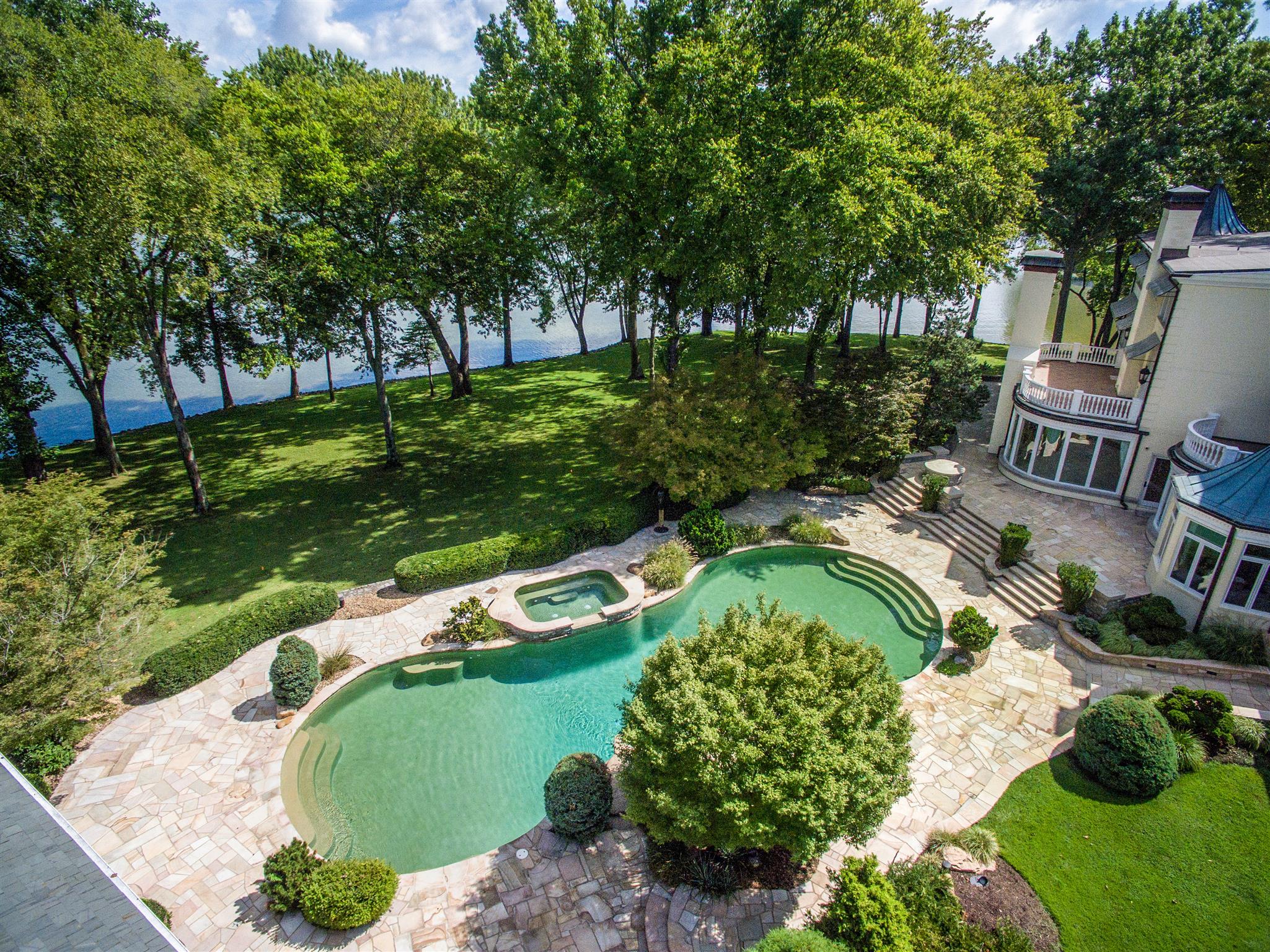 175 Cherokee Dock Road Lebanon, TN 37087 - Photo 24 of 30 a view of a garden with a fountain