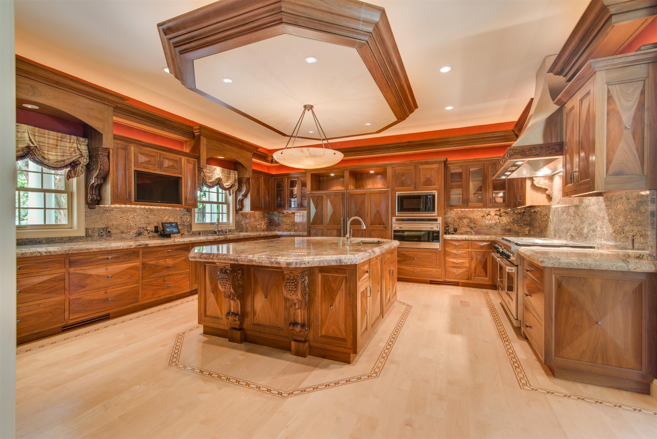 175 Cherokee Dock Road Lebanon, TN 37087 - Photo 8 of 30 a large white kitchen with a large window and stainless steel appliances