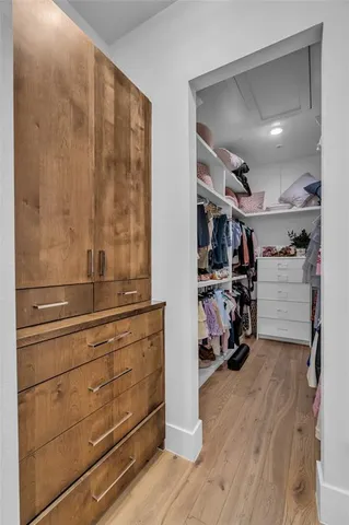 a view of a hallway with stairs