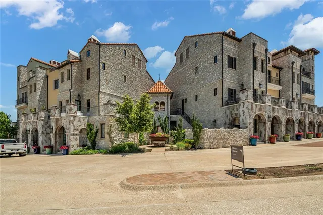a stone house with a outdoor space