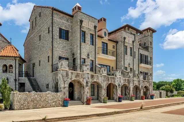 a view of a building with a yard