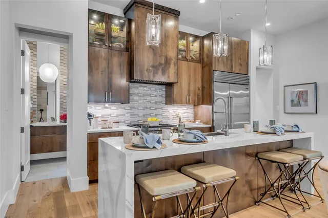 a kitchen with a sink cabinets and counter space