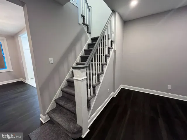 a view of entryway with wooden floor