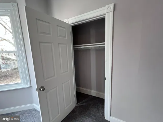 a view of closet area with window