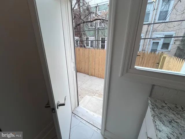 a view of a wooden fence