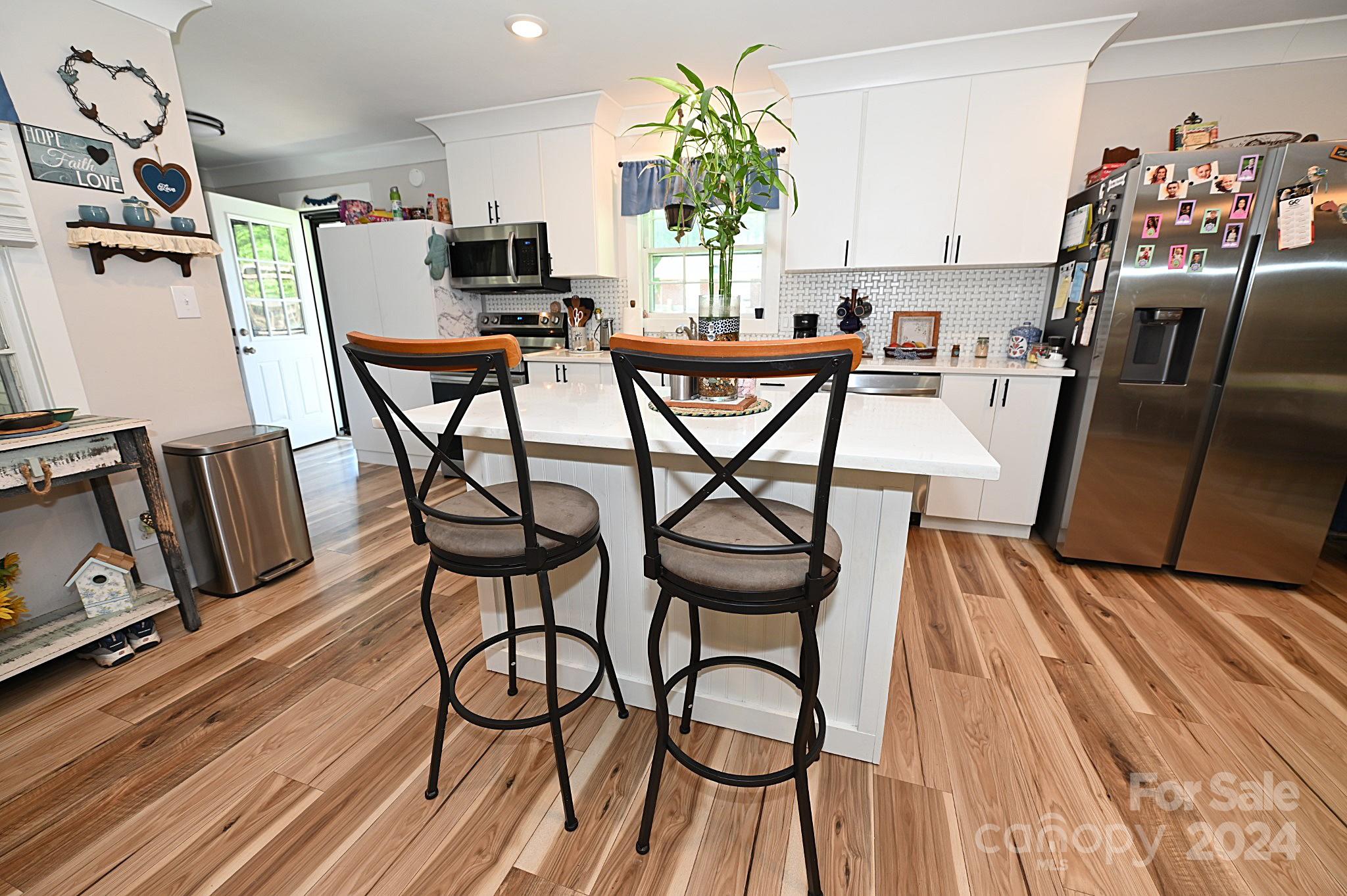 110 Sunny Lane Cherryville, NC 28021 - Photo 13 of 26 a dining room with furniture and wooden floor
