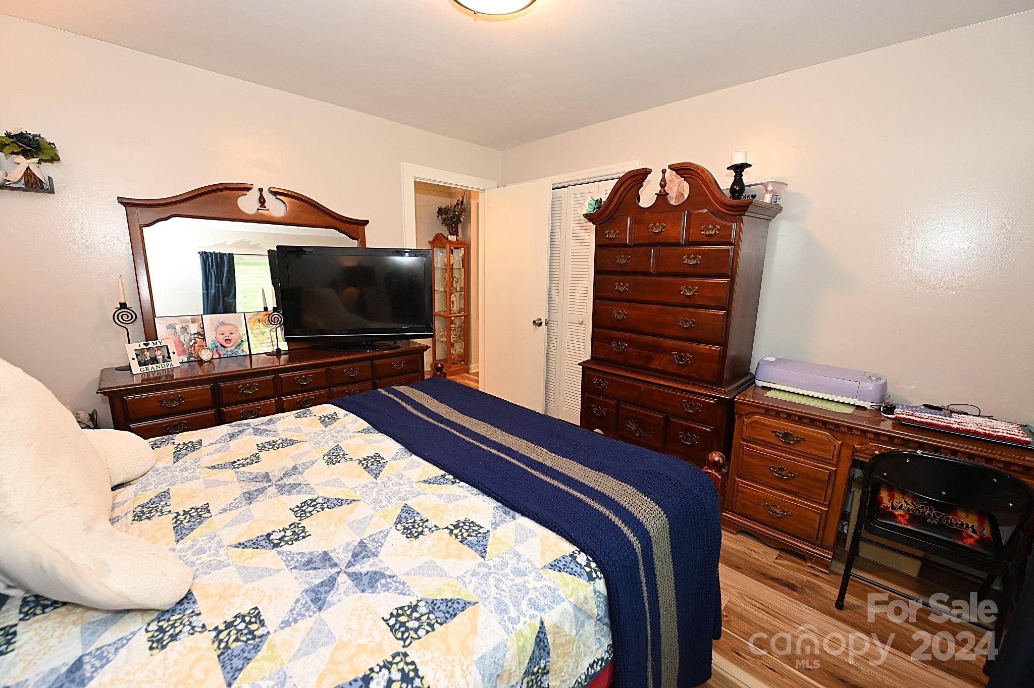 110 Sunny Lane Cherryville, NC 28021 - Photo 16 of 26 a bedroom with a bed and a television
