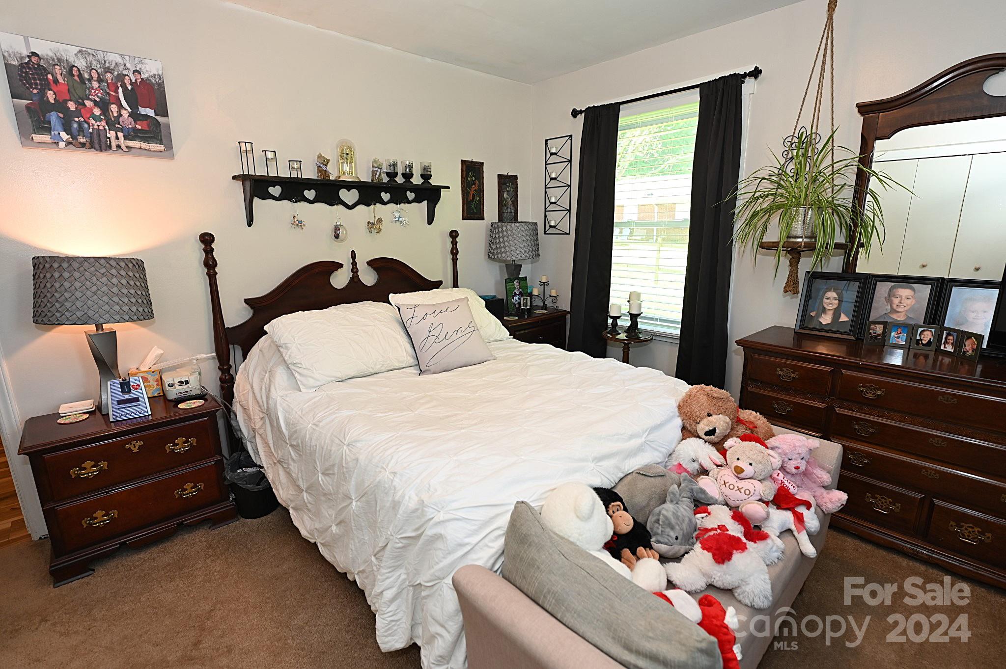 110 Sunny Lane Cherryville, NC 28021 - Photo 19 of 26 a bedroom with a bed and window