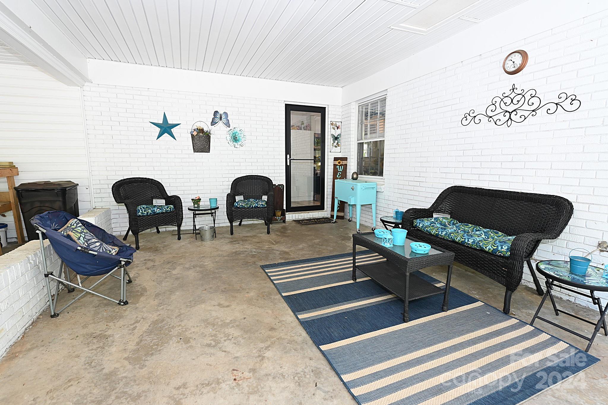 110 Sunny Lane Cherryville, NC 28021 - Photo 22 of 26 a living room with furniture and a rug