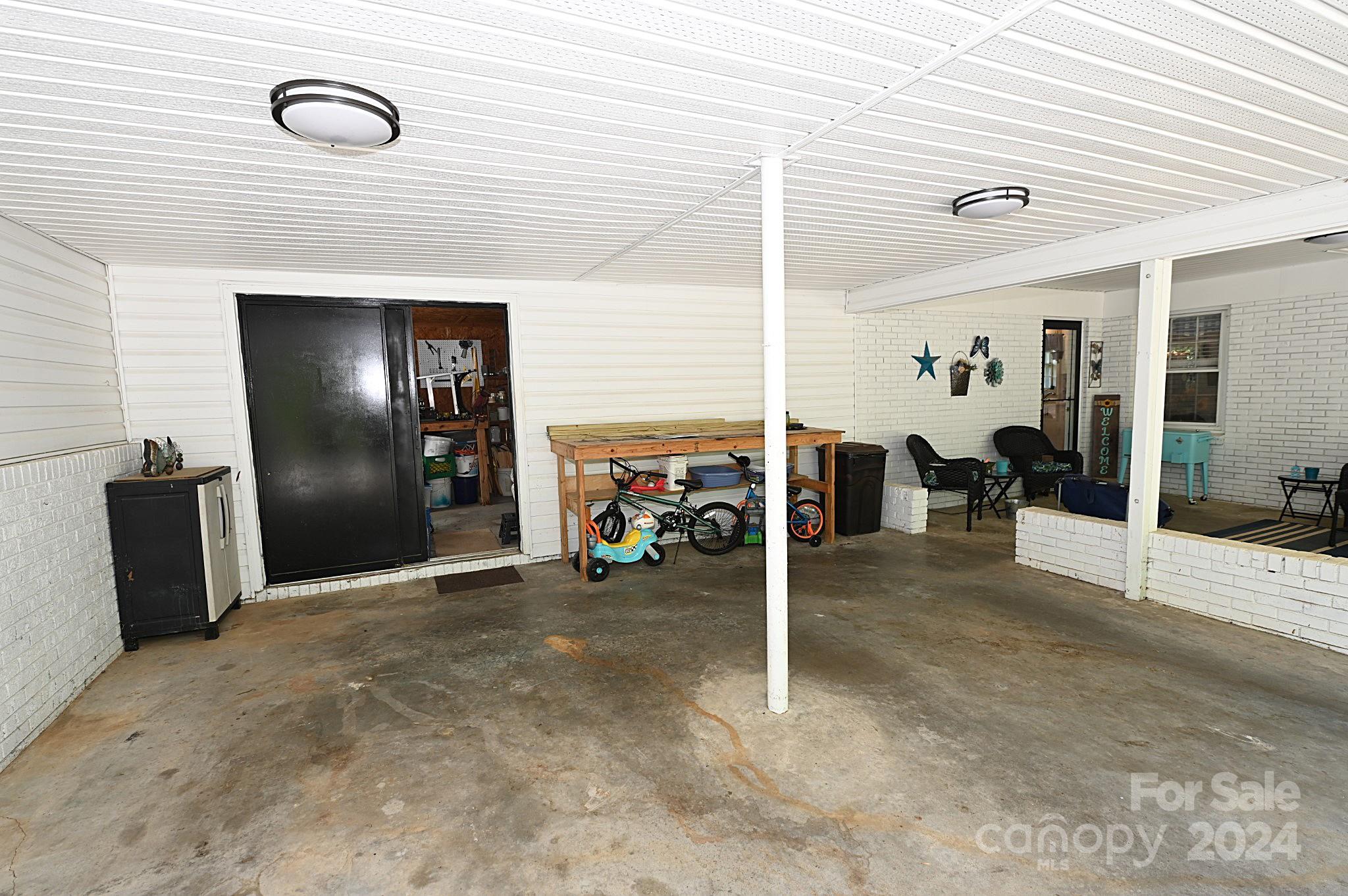 110 Sunny Lane Cherryville, NC 28021 - Photo 23 of 26 a view of a livingroom with closet and furniture