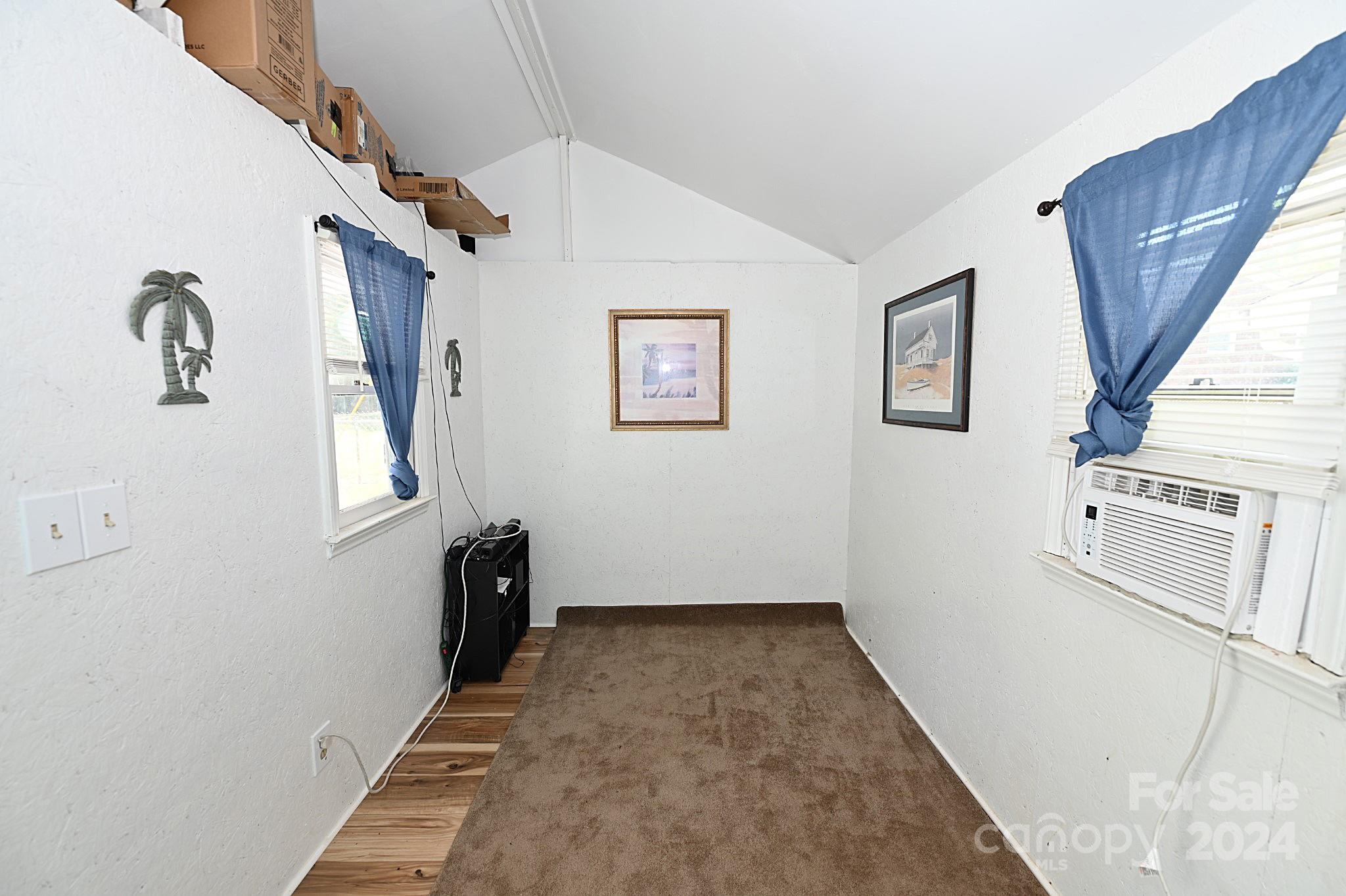 110 Sunny Lane Cherryville, NC 28021 - Photo 24 of 26 a view of a hallway with windows