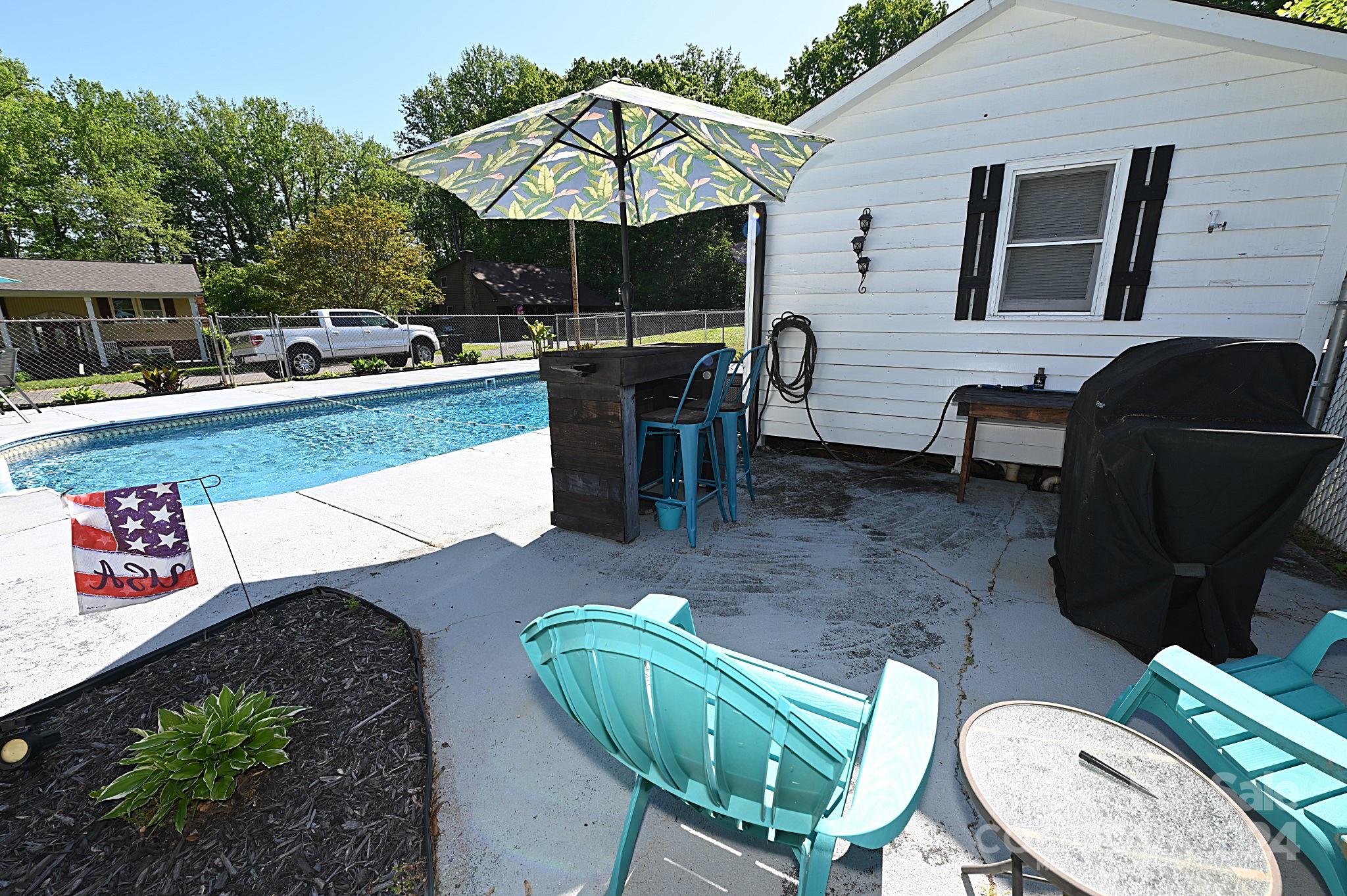 110 Sunny Lane Cherryville, NC 28021 - Photo 5 of 26 a view of a chairs and table in the patio