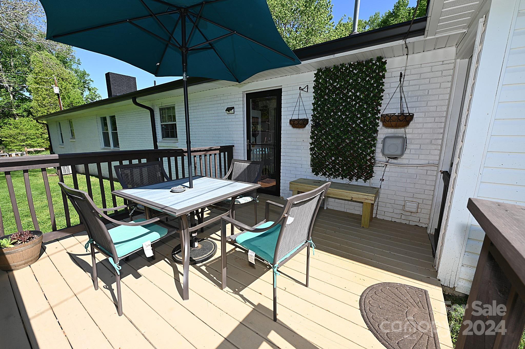 110 Sunny Lane Cherryville, NC 28021 - Photo 6 of 26 a view of a chairs and table in patio