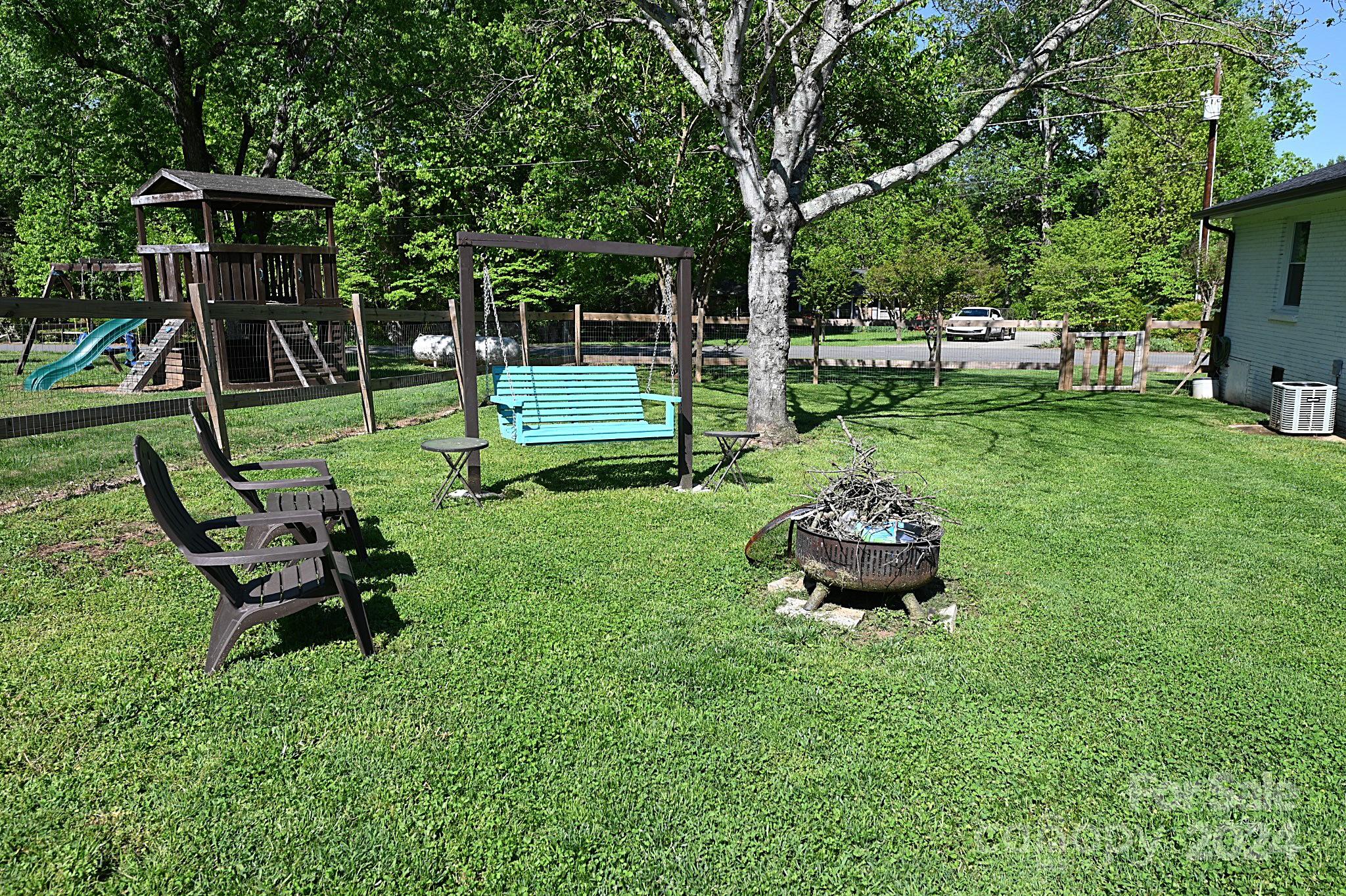 110 Sunny Lane Cherryville, NC 28021 - Photo 9 of 26 a garden view with a seating space