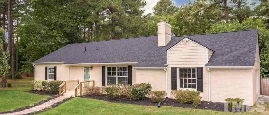 3705 Edwards Mill Road Raleigh, NC 27612 - Photo 2 of 25 a view of a house with a yard and plants