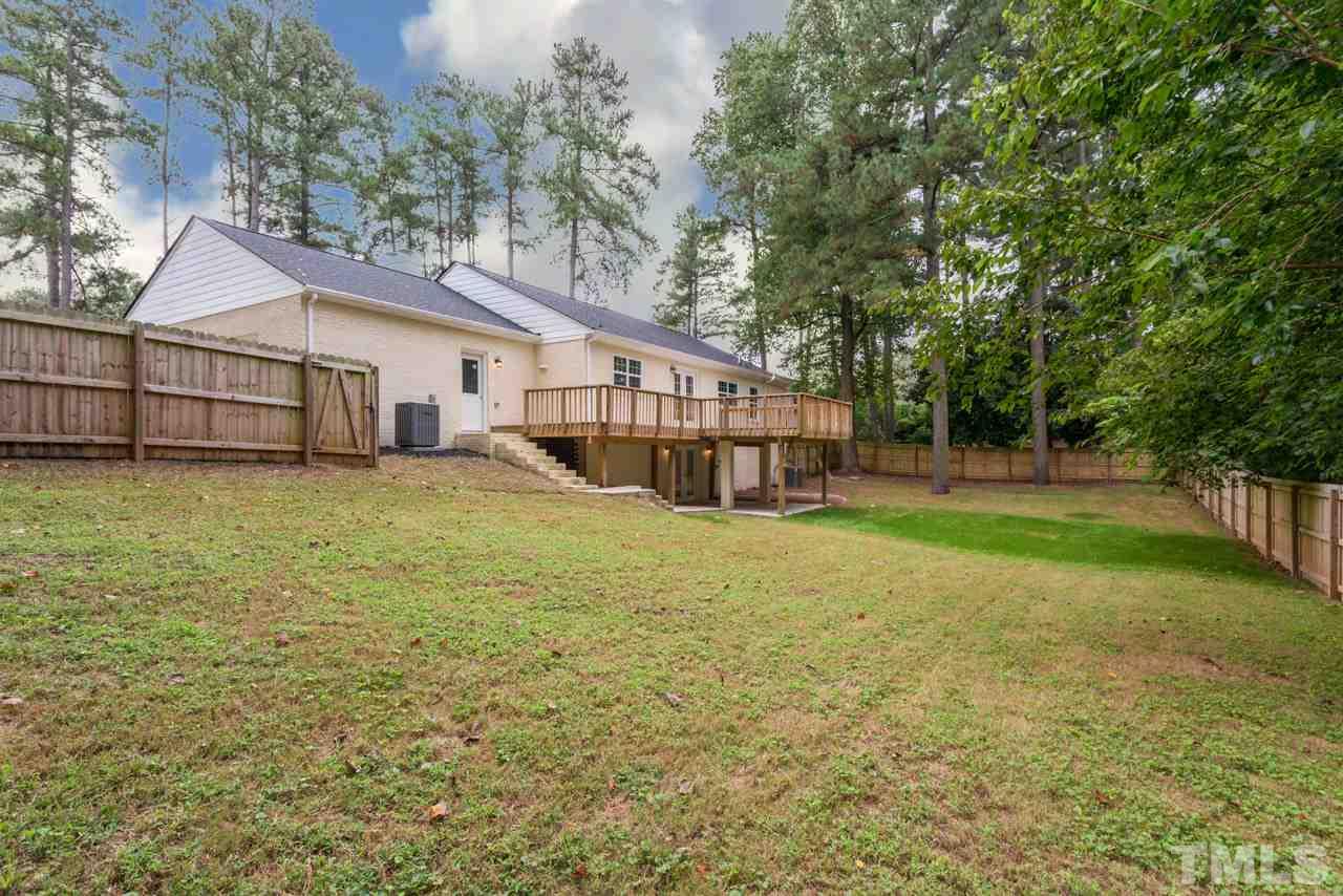 3705 Edwards Mill Road Raleigh, NC 27612 - Photo 3 of 25 a view of a house with a yard and sitting area