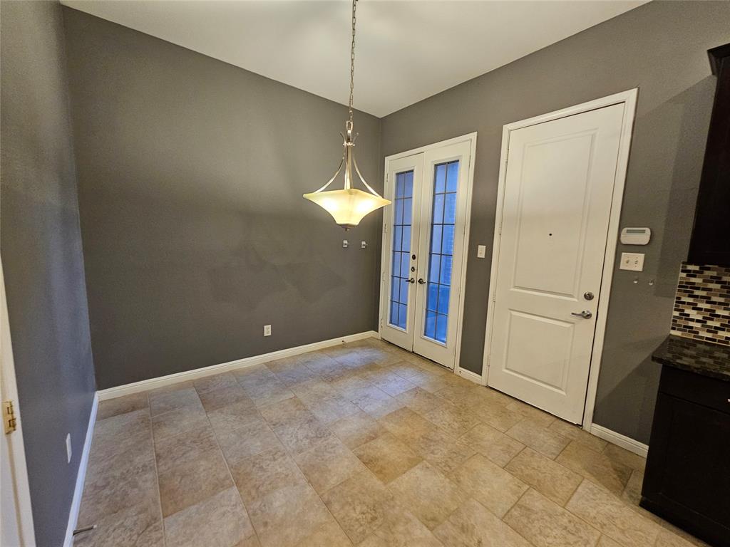 8627 Calvin Road Irving, TX 75063 - Photo 13 of 33 a view of a room with a flat screen tv