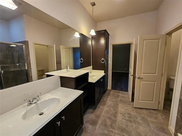 a black and white photo of a kitchen