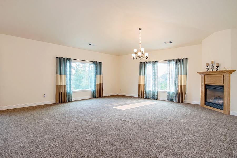 1676 Spring Street Medford, OR 97504 - Photo 7 of 15 The living room is huge and allows a lot
