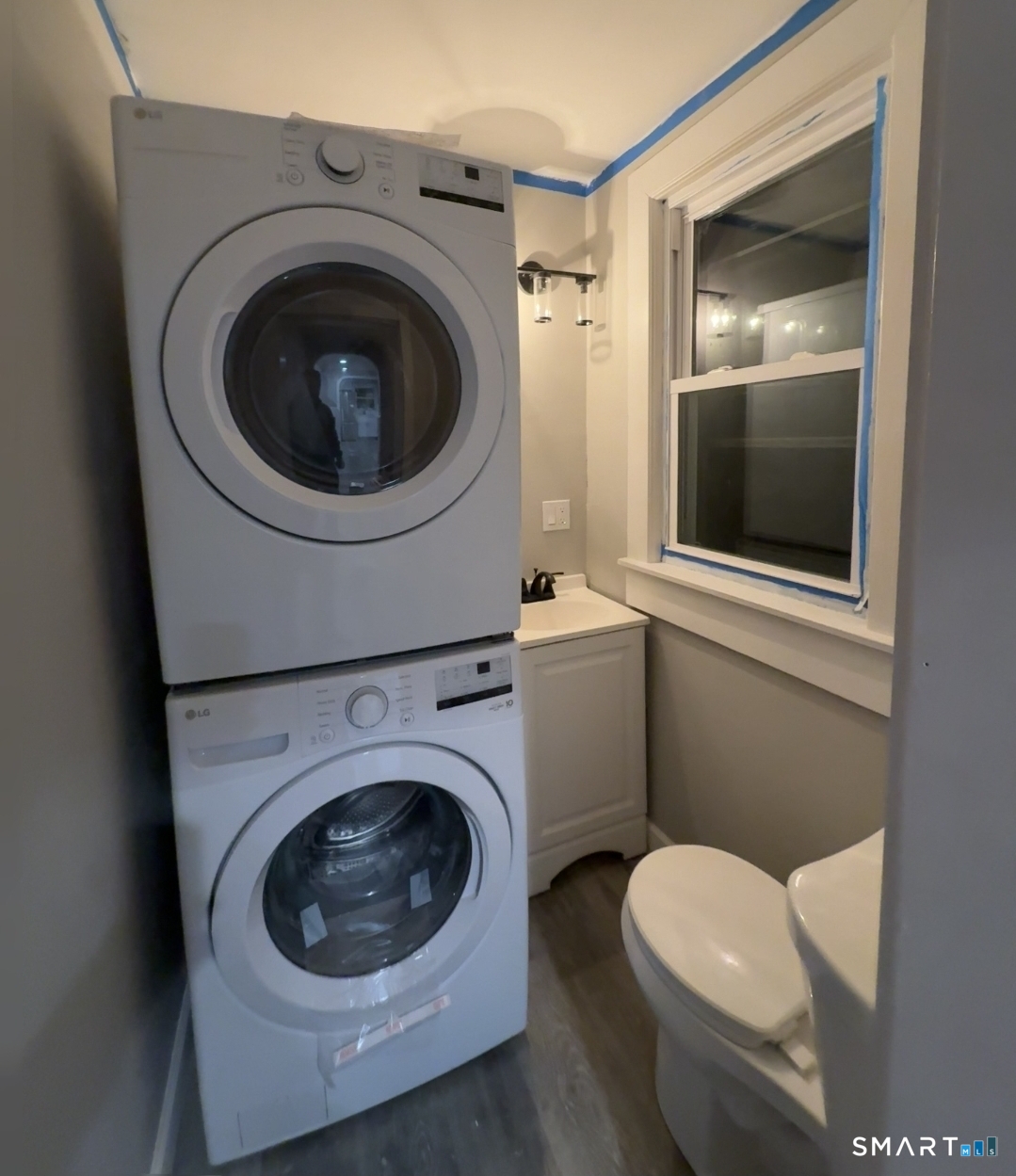 12 Mechanic Street Moosup, CT 06354 - Photo 6 of 8 a utility room with dryer and washer