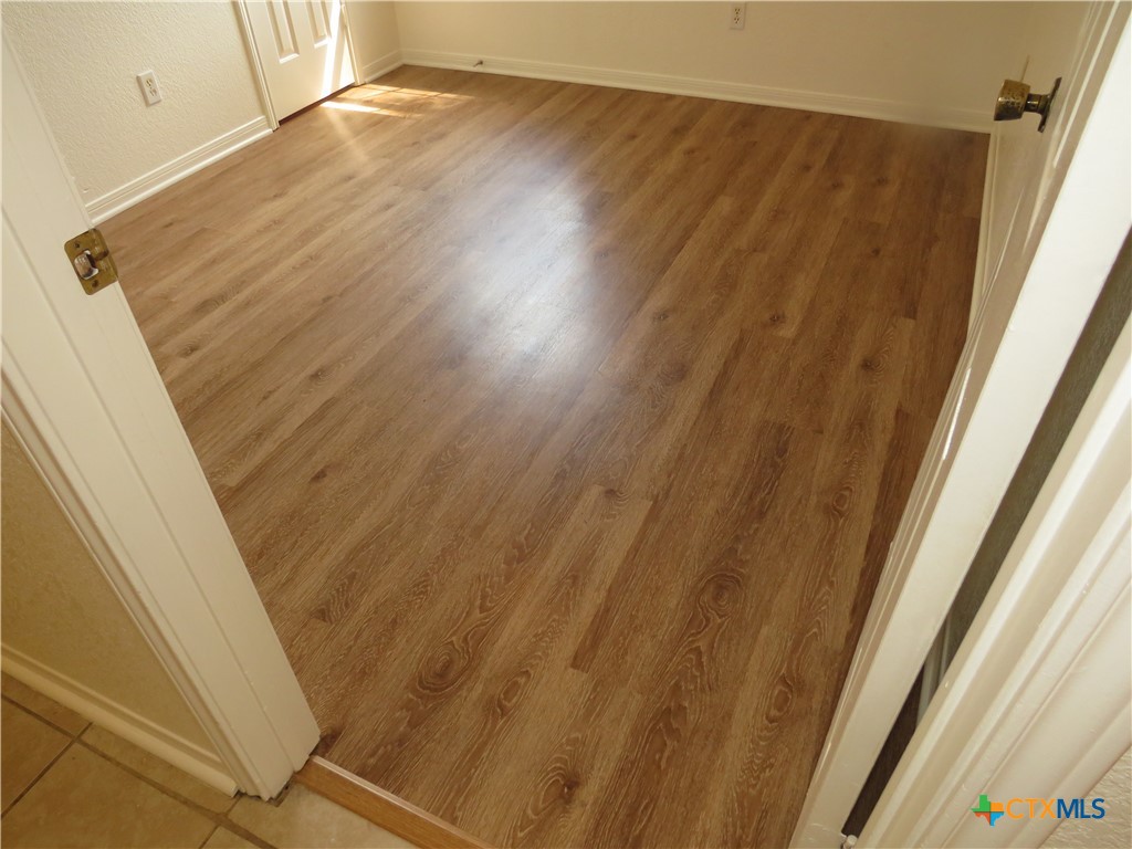 5009 James Loop Killeen, TX 76542 - Photo 16 of 24 a view of wooden floor