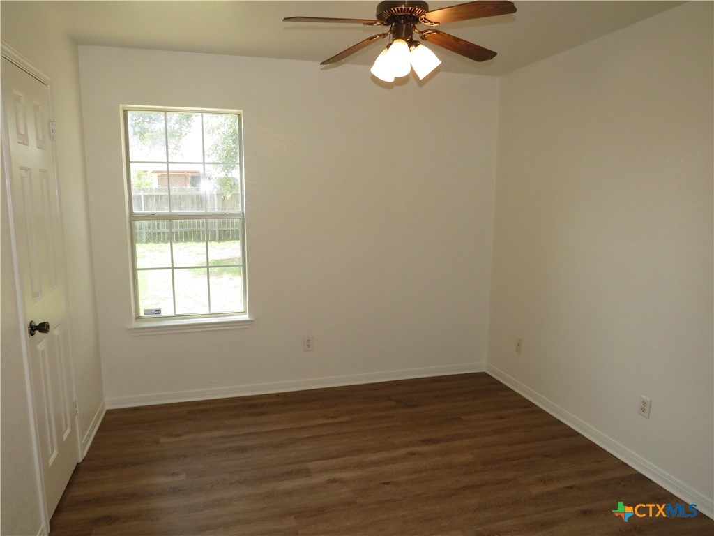 5009 James Loop Killeen, TX 76542 - Photo 19 of 24 wooden floor in an empty room with a window