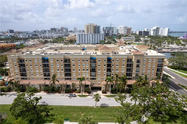 a room with furniture pool and wall paintings